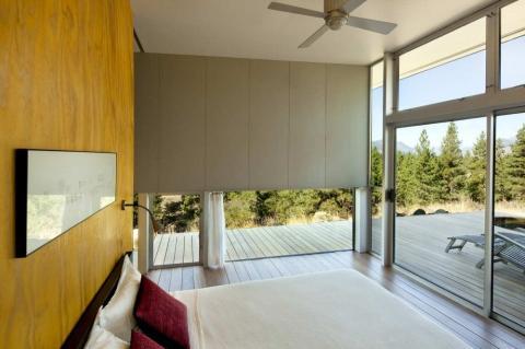 Contemporary Bedroom with wall of windows