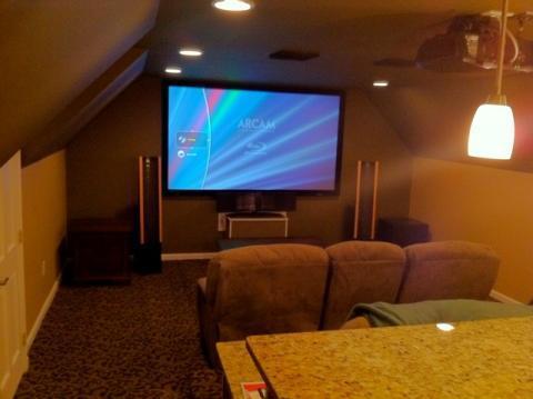 Traditional Home Theater with attic space turned into movie room