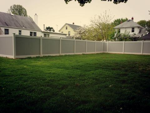 Modern Landscape with grey and white fence