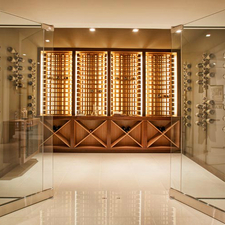 Contemporary Wine Cellar with in cabinet lighting