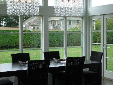 Modern Dining Room with floor to ceiling windows