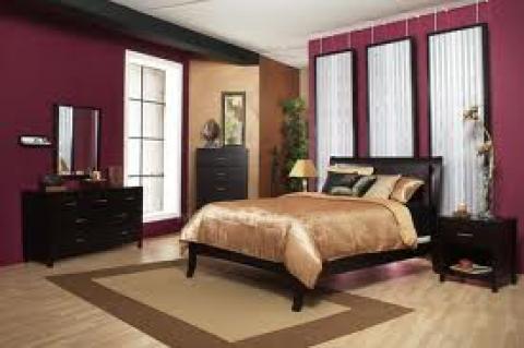 Contemporary Bedroom with burgundy painted walls