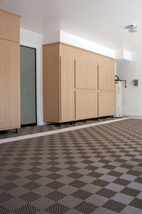 Contemporary Garage with brown and tan tile garage flooring