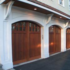 Transitional Garage with raynor one-piece garage doors