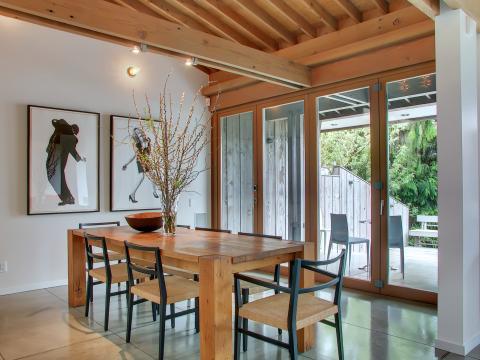 Contemporary Dining Room with wood and metal dining chairs