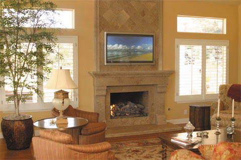 Traditional Living Room with cast concrete fireplace surround