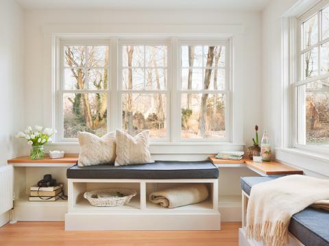 Transitional Sunroom with functional small sitting area