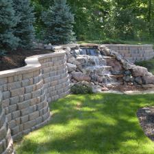 Transitional Landscape with concrete stone retaining wall