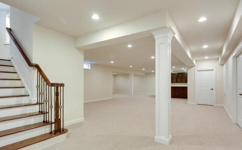 Traditional Basement with white walls and trim