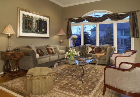 Traditional Living Room with beige chairs with wooden trims