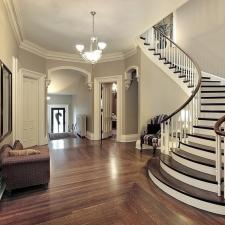 Traditional Entry with dark stained handrails