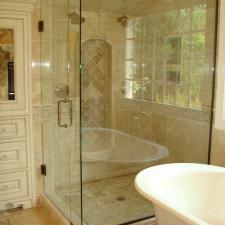 Traditional Bathroom with clear frame less shower door