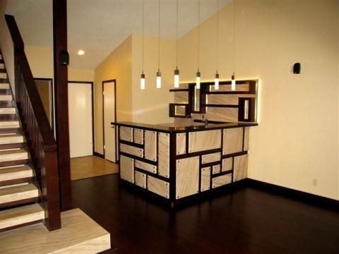 Modern Basement with multiple tile pattern surround