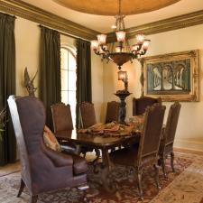 Traditional Dining Room with dark brown leather dining chairs