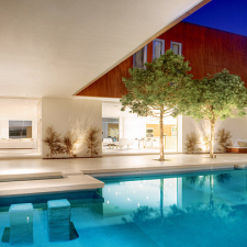 Contemporary Pool with white exterior walls and ceiling