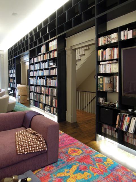 Contemporary Library with black painted book shelves