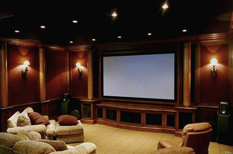 Transitional Home Theater with warm and inviting home theater