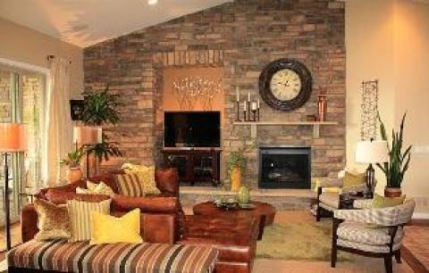 Eclectic Family Room with large leather sectional sofa