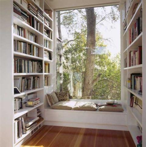 Contemporary Library with white shelves