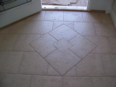 Transitional Entry with ceramic tile accent inlay