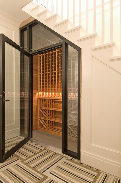 Transitional Wine Cellar with striped carpet tiles