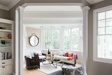 Contemporary Sunroom with white crown molding