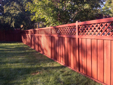 Transitional Landscape with beautiful stained fence