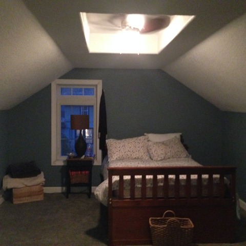Modern Bedroom with blue eggshell interior paint