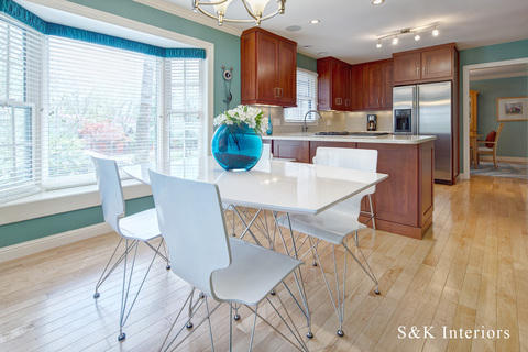 Transitional Dining Room with stainless steel appliances