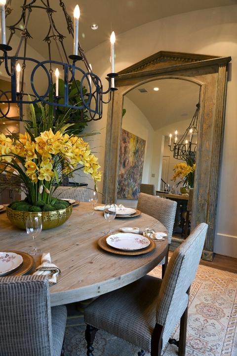 Transitional Dining Room with candle light chandelier