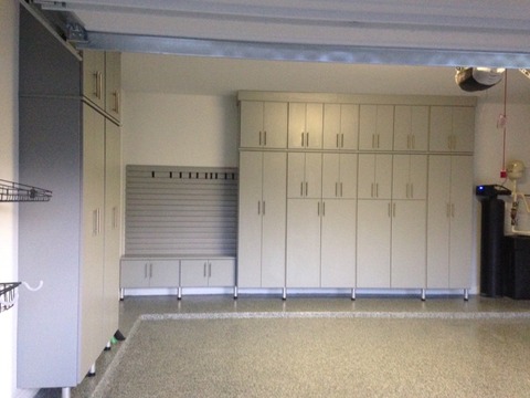 Modern Garage with hanging panels for adjustable storage