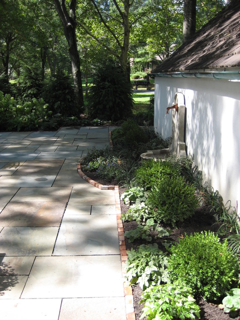 Transitional Landscape with white exterior paint