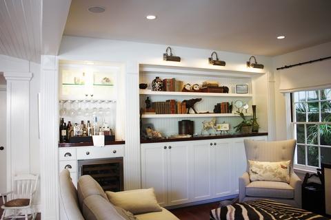 Eclectic Family Room with white recessed panel cabinets