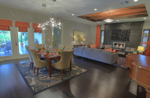 Transitional Dining Room with orange window treatments