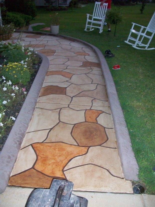 Traditional Landscape in Angier flower bed, concrete edging by