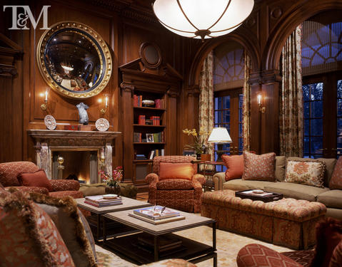 Traditional Library with marble fireplace surround and mantle