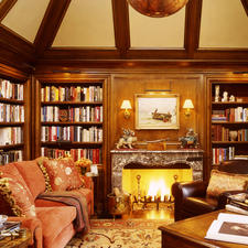 Transitional Library with dark wood stained ceiling beams