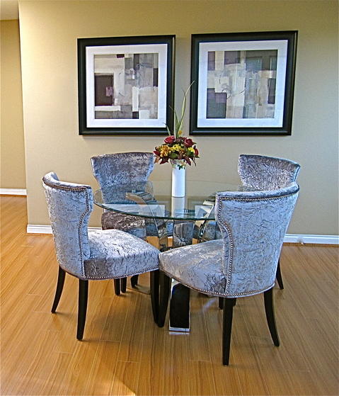 Transitional Dining Room with light laminate wood floors