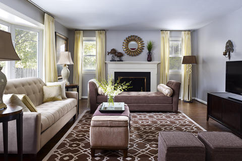 Transitional Living Room with off white floor to ceiling curtains