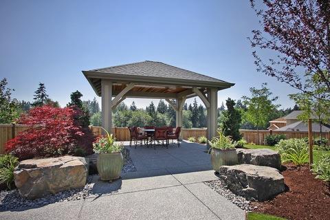 Transitional Landscape with custom built gazeebo covered patio