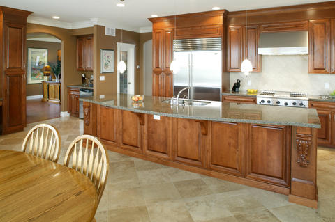 Traditional Kitchen with curved island counter