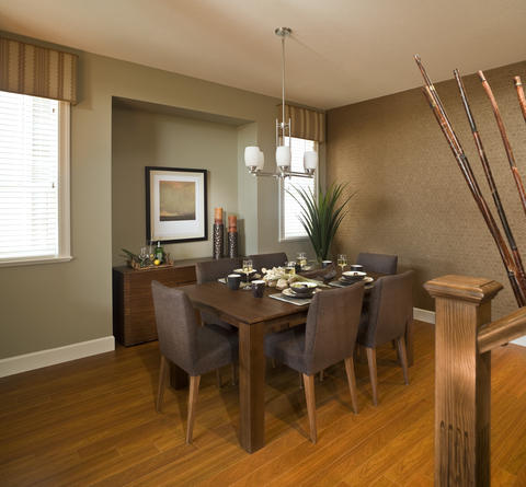 Transitional Dining Room with dark grey upholstered chairs