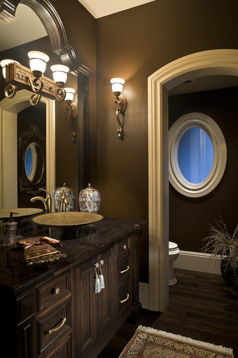 Traditional Bathroom with custom wood framed vanity mirror