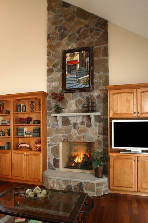 Transitional Family Room with slate stone fire place