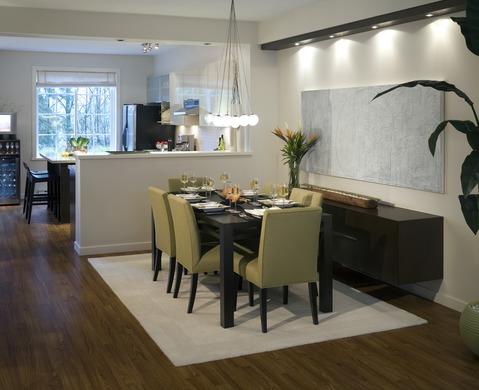 Modern Dining Room with wall mounted downward lighting