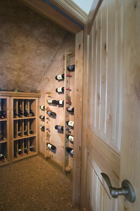 Contemporary Wine Cellar with light brown painted walls