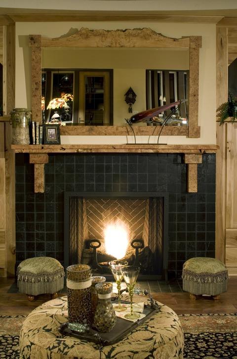 Eclectic Family Room with light rustic wood wall mounted mirror above fire place