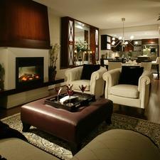 Contemporary Family Room with wall mounted cabinet with mirror back
