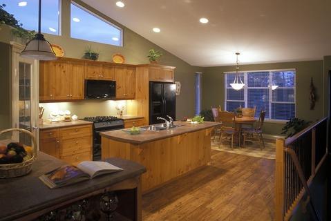 Traditional Kitchen with medium wood stained floor