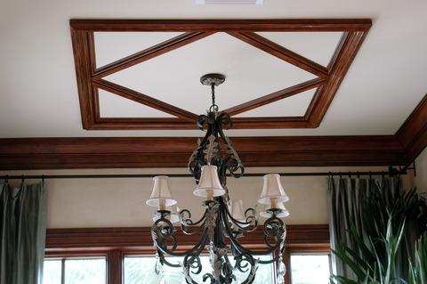 Traditional Dining Room with wrought iron drapery hardware